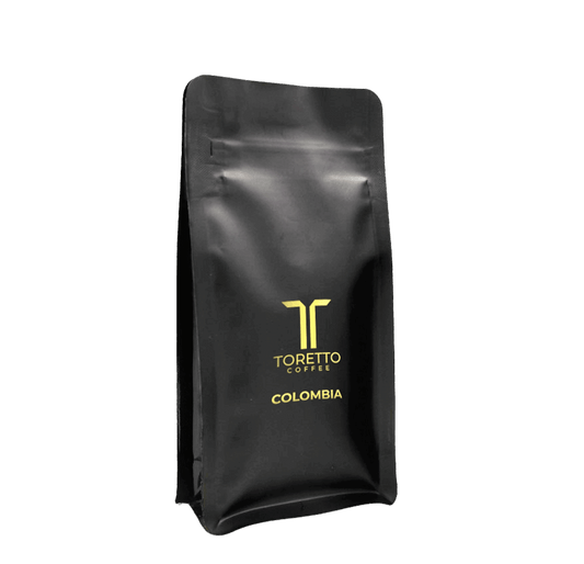 Toretto Coffees Colombian coffee beans in black packaging, offering bold, lively flavors from high-altitude regions.