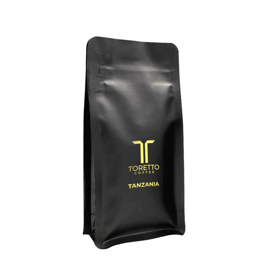 Tanzania coffee bag with bold branding, offering rich, vibrant flavors from Mount Kilimanjaro's volcanic soils.