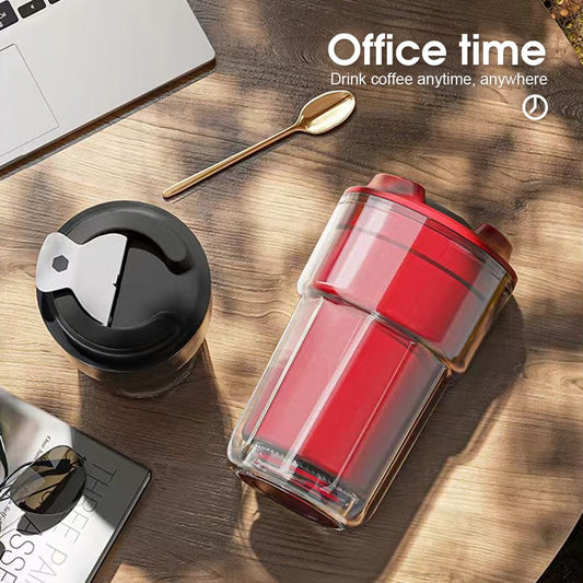 Red insulated 460ml coffee cup on a desk with sunglasses and a spoon, perfect for keeping drinks hot or cold during office time.